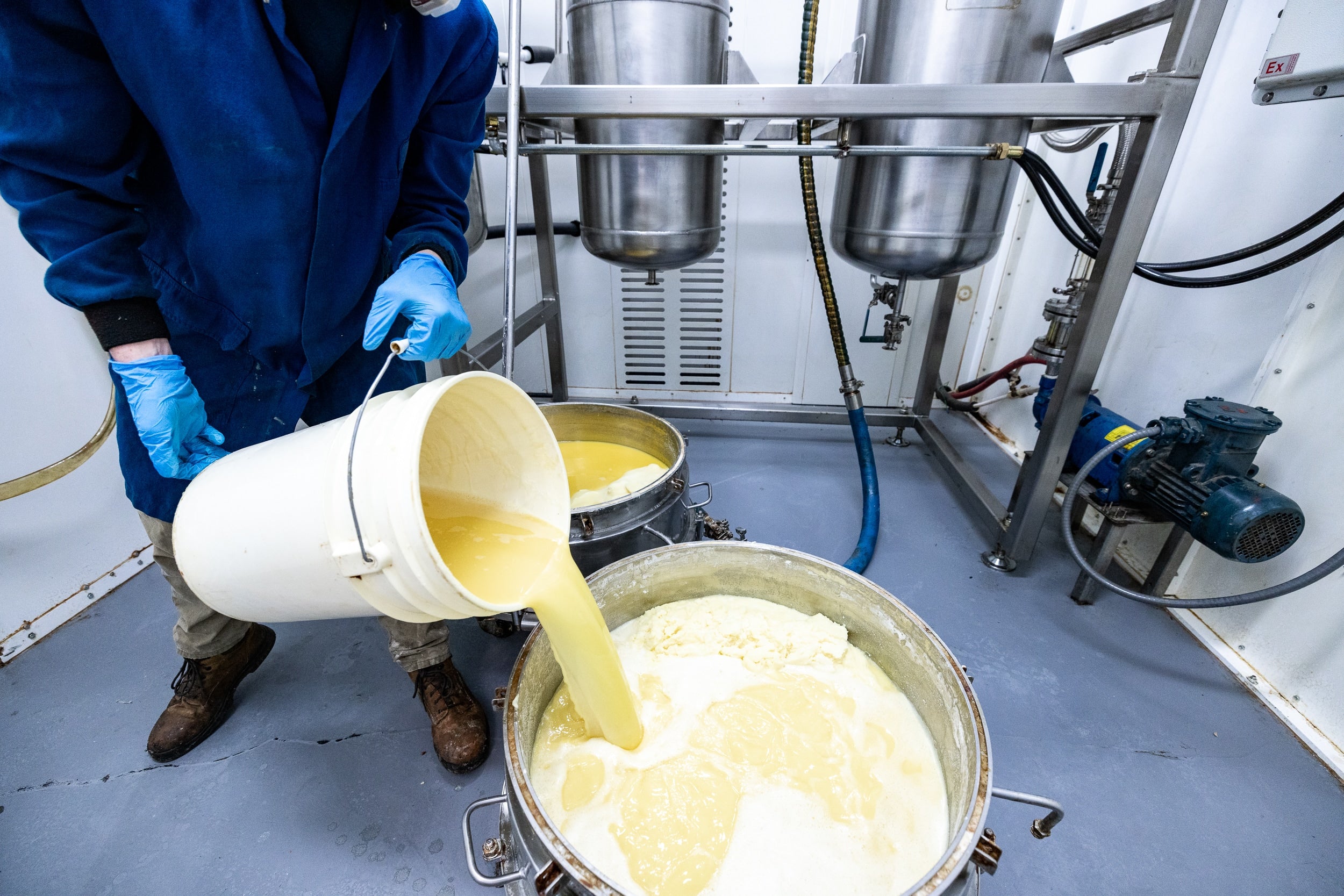 A man wearing a blue coat - KND Labs